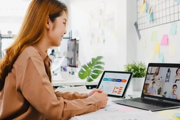 Girl accessing qlearn online courses for upskilling on her tablet and laptop