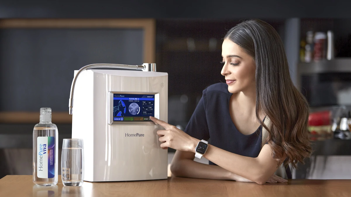 Woman pressing the screen of the HomePure Viva