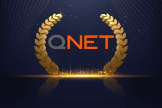 QNET logo inbetween victory ferns for QNET awards