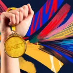 A hand holding a QNET gold medal to symbolize QNET Business Success and how QNET Champions Champions with its services and products