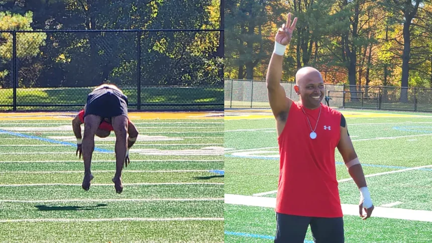 a still of QNET IR Anup Debnath's successful Guinness World Record attempt at 21 back handsprings and then posing for the camera with Amezcua wellness product, Chi Pendant 4, around his neck afterwards